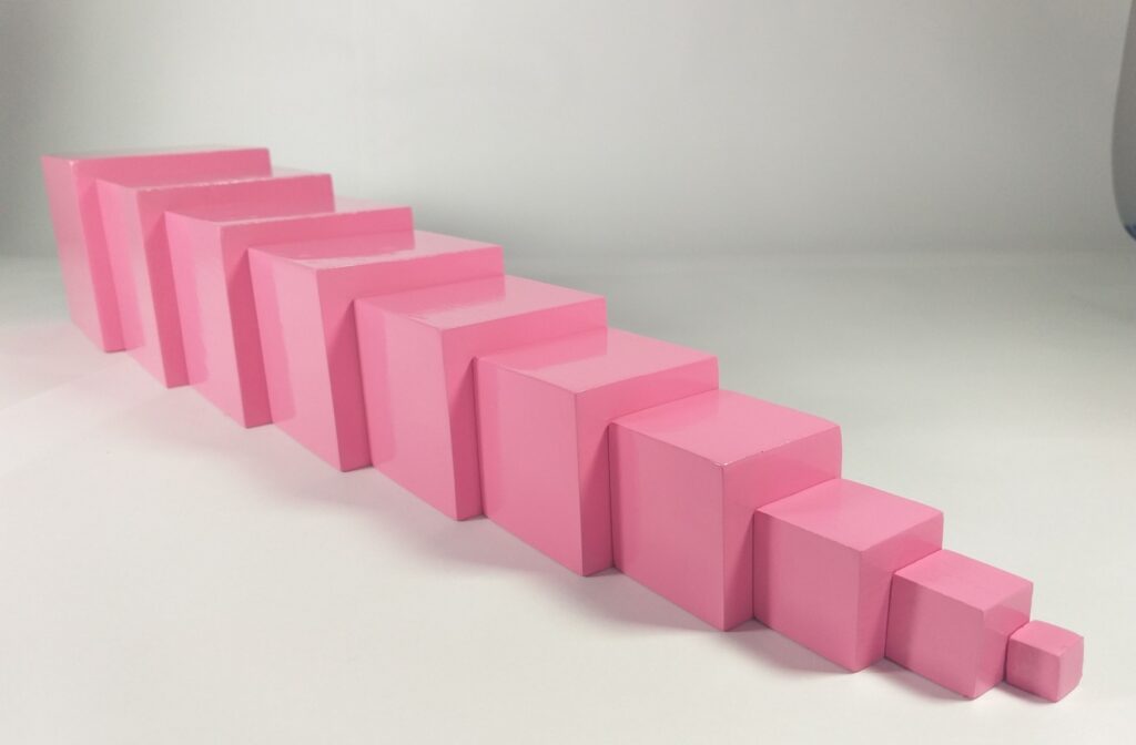 A Montessori Pink Tower on its side
